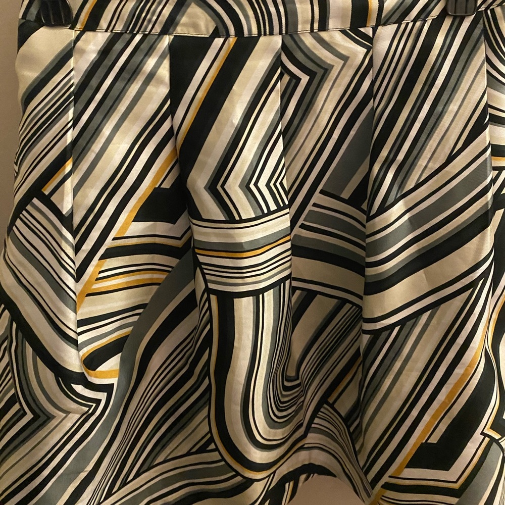 Pleated canary midi skirt